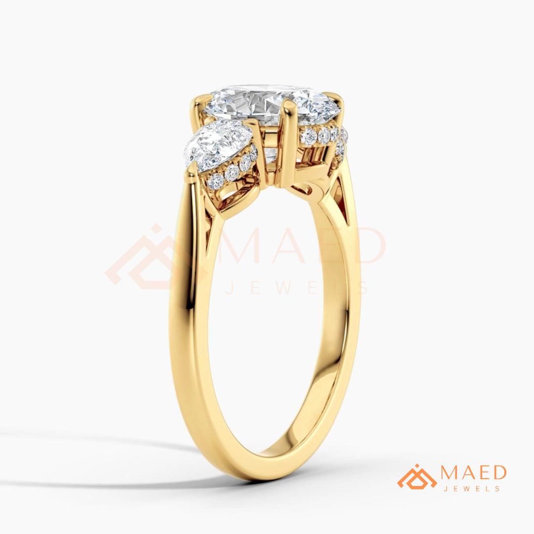 Classic Oval Cut Three-Stone Engagement Ring with Pear Side Stones in Silver, 14K Gold & Rose Gold