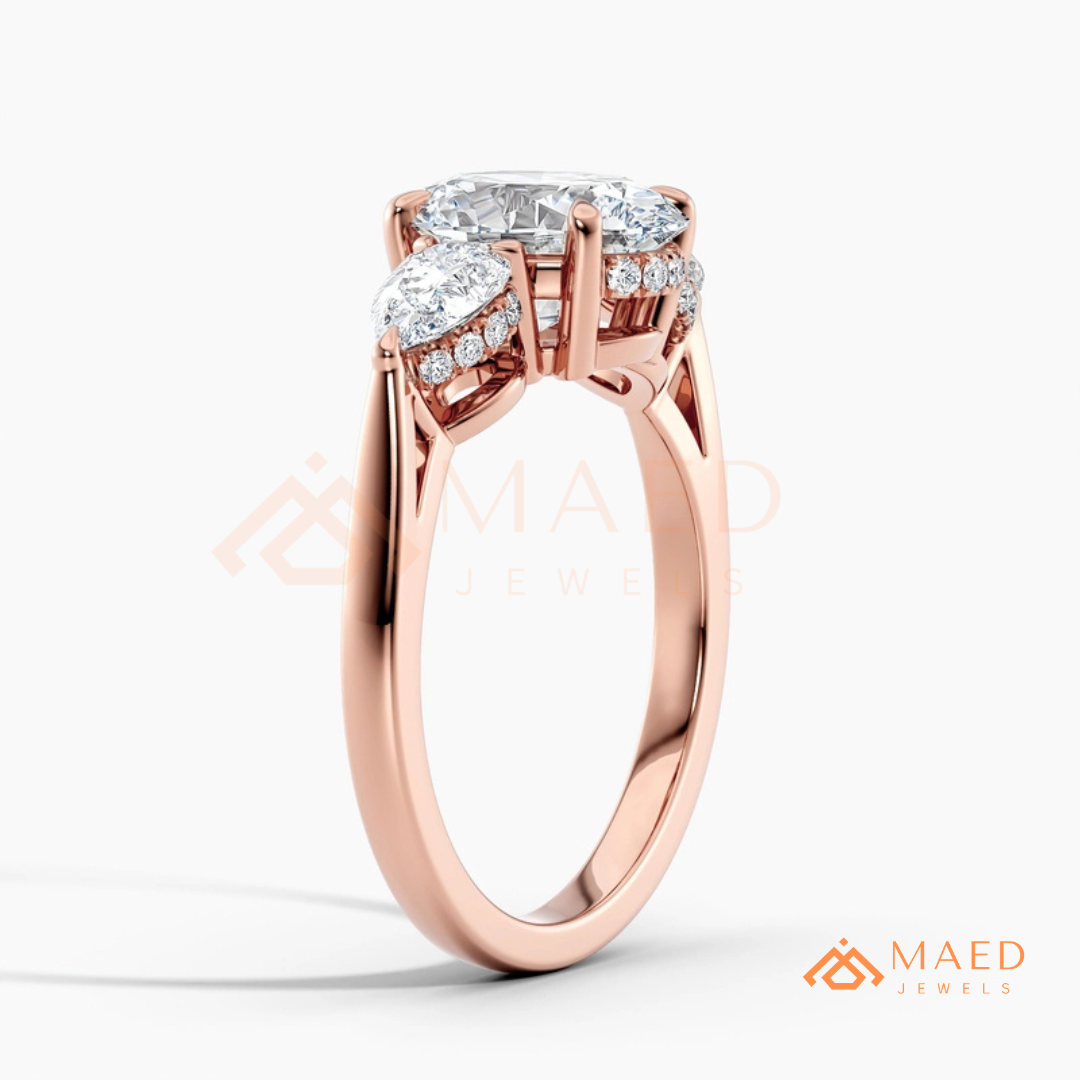 Classic Oval Cut Three-Stone Engagement Ring with Pear Side Stones in Silver, 14K Gold & Rose Gold