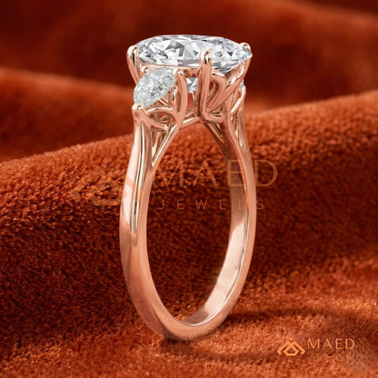 Oval Cut Engagement Ring with Pear Side Stones in Silver, 14K Gold, & 14K Rose Gold