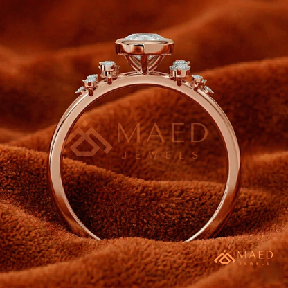 Pear Cut Bezel Set Engagement Ring with Cluster Accent Diamonds in 14K Gold, Rose Gold & Silver