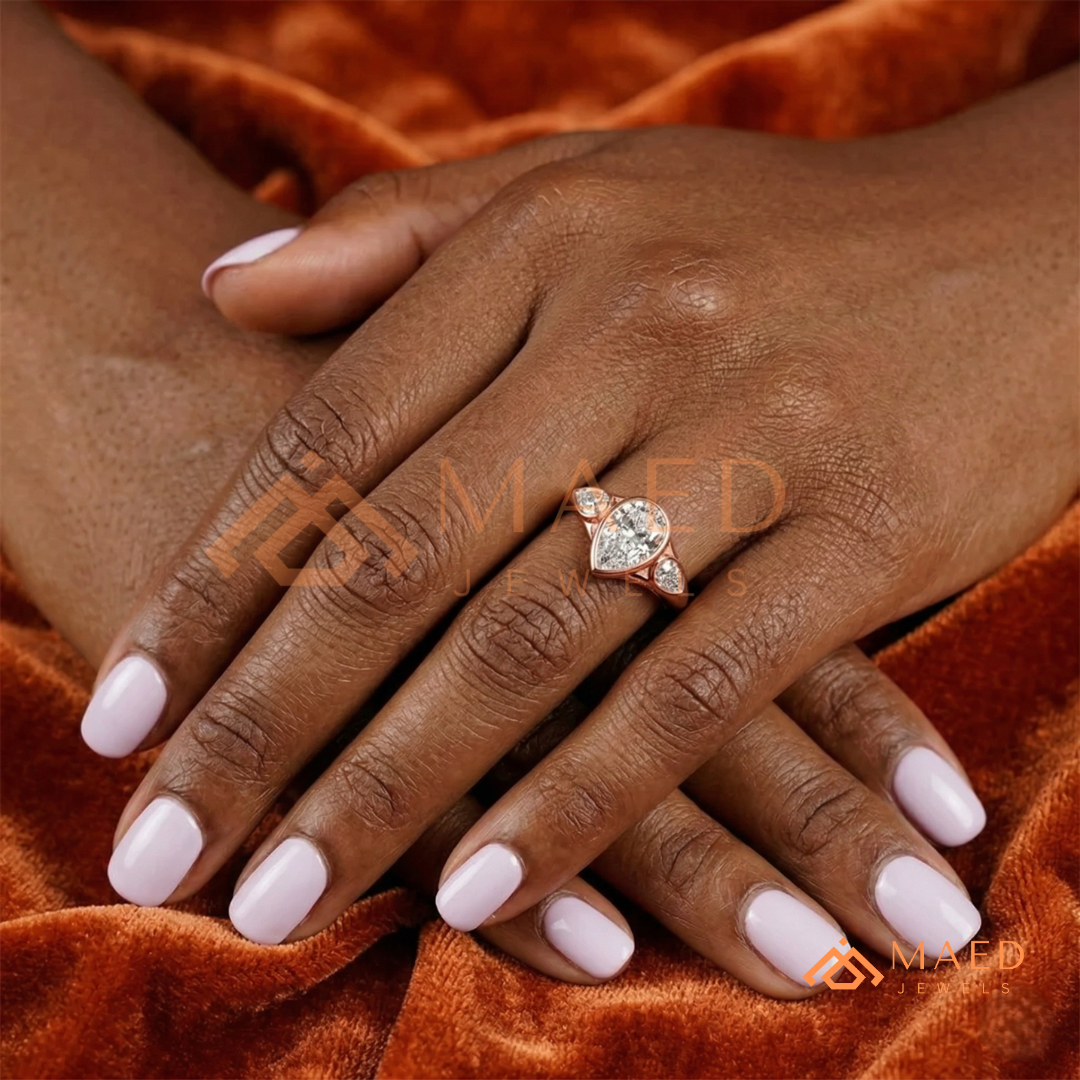 Bezel Set Oval Engagement Ring with Pear Side Stones in Silver, 14K Gold, & 14K Rose Gold