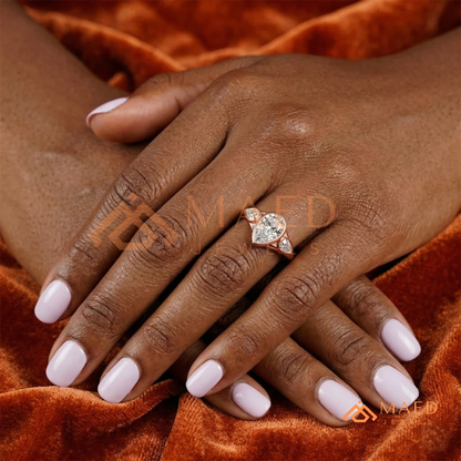 Bezel Set Oval Engagement Ring with Pear Side Stones in Silver, 14K Gold, & 14K Rose Gold