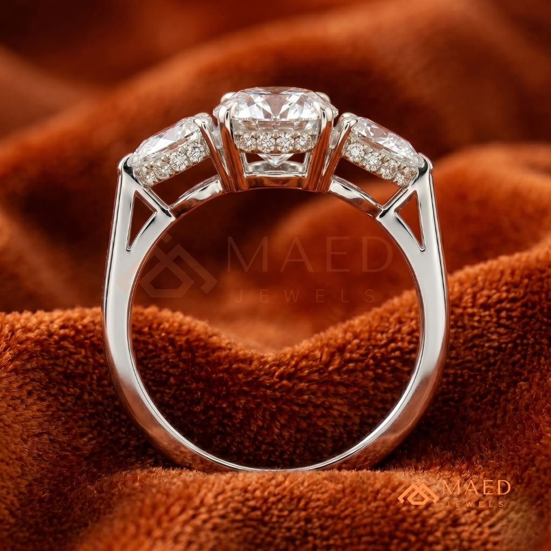 Classic Oval Cut Three-Stone Engagement Ring with Pear Side Stones in Silver, 14K Gold & Rose Gold