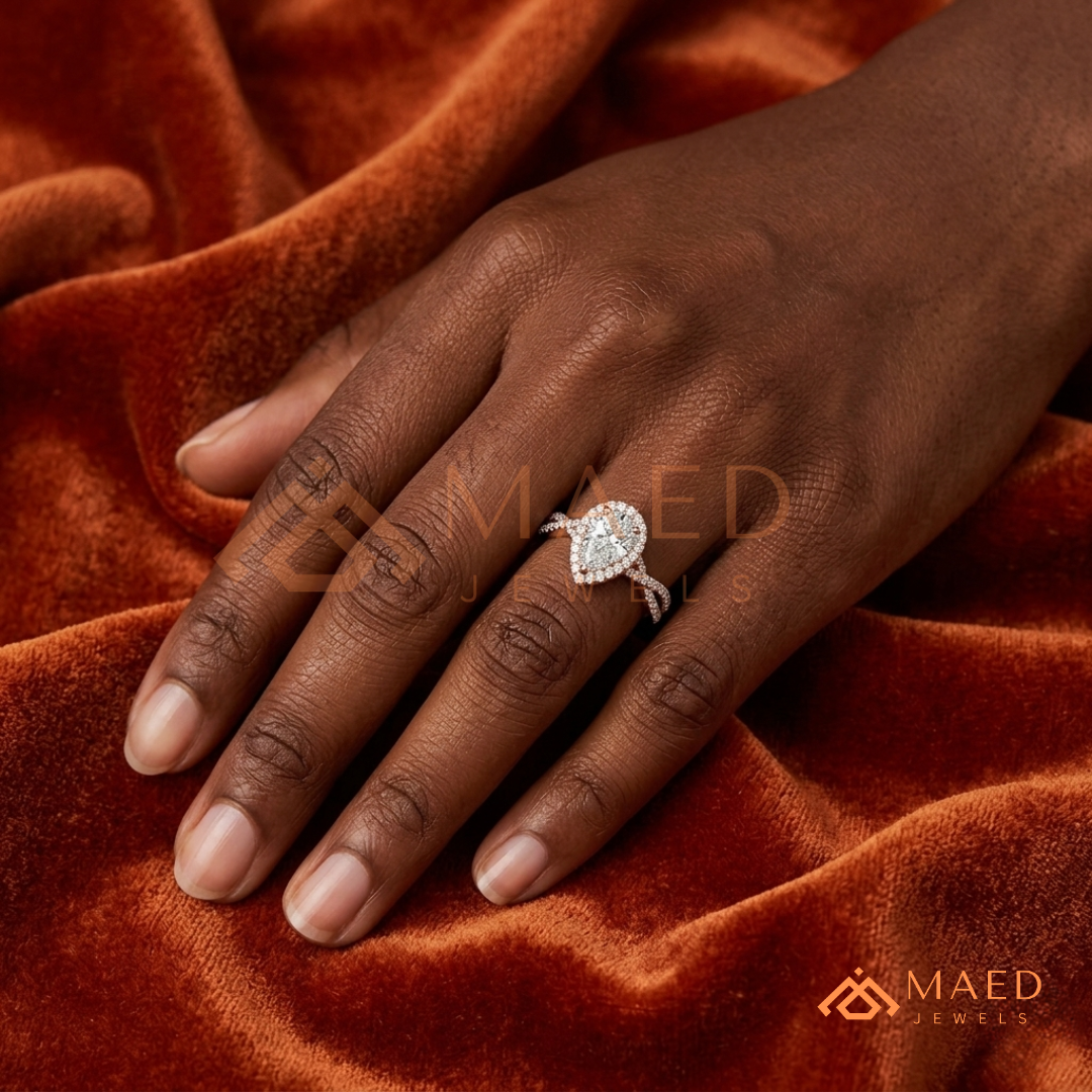 Pear-Cut Moissanite/Diamond Halo Engagement Ring with Twisted Pavé Band