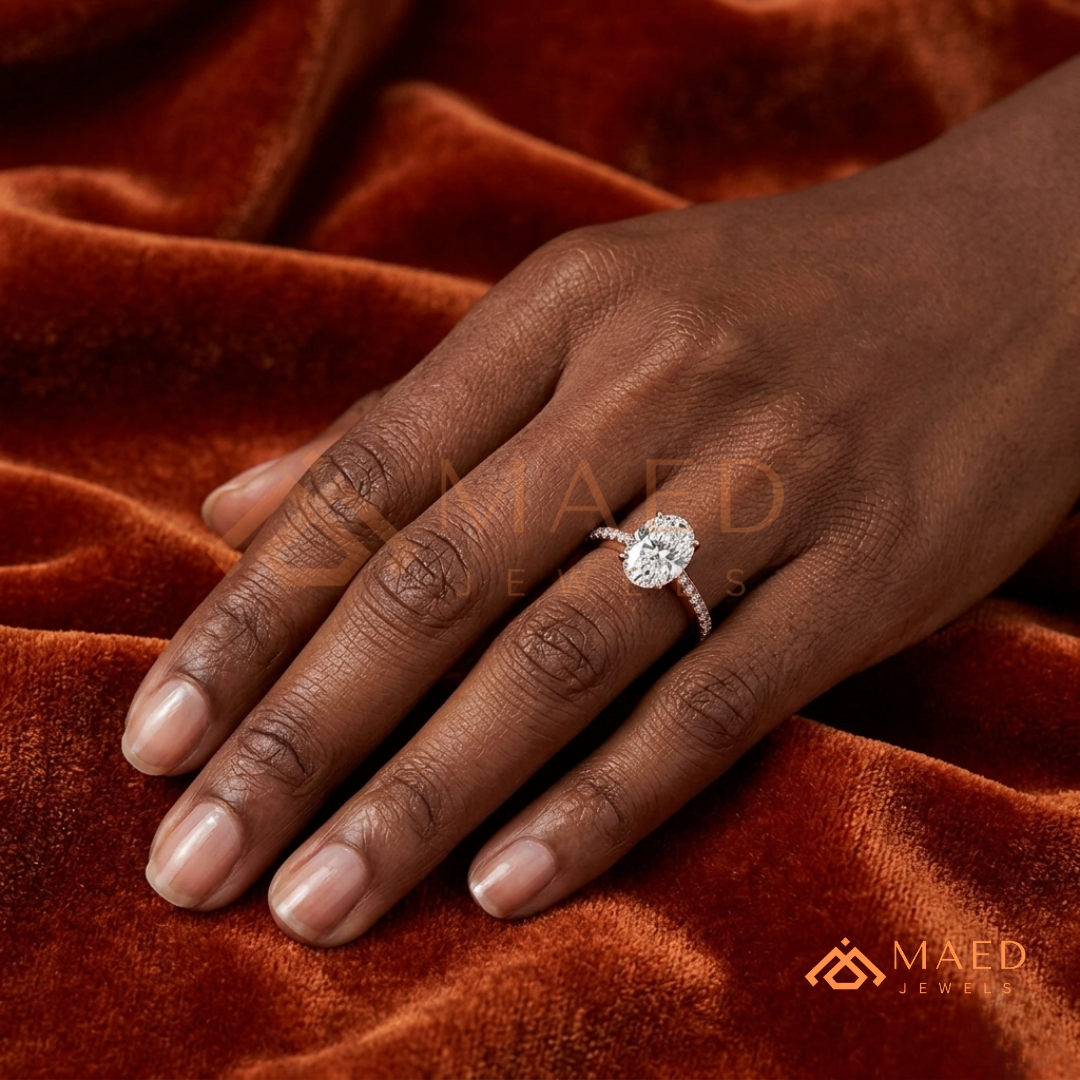Elegant Oval-Cut Solitaire Engagement Ring with Pavé Band