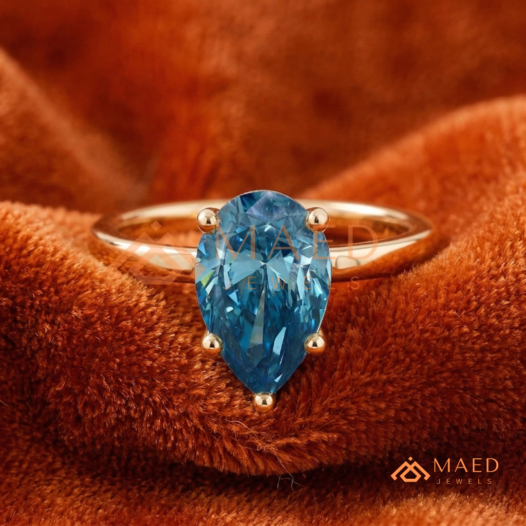 The Oceanne Pear Cut Solitaire Ring | Silver, 14K Yellow, & Rose Gold