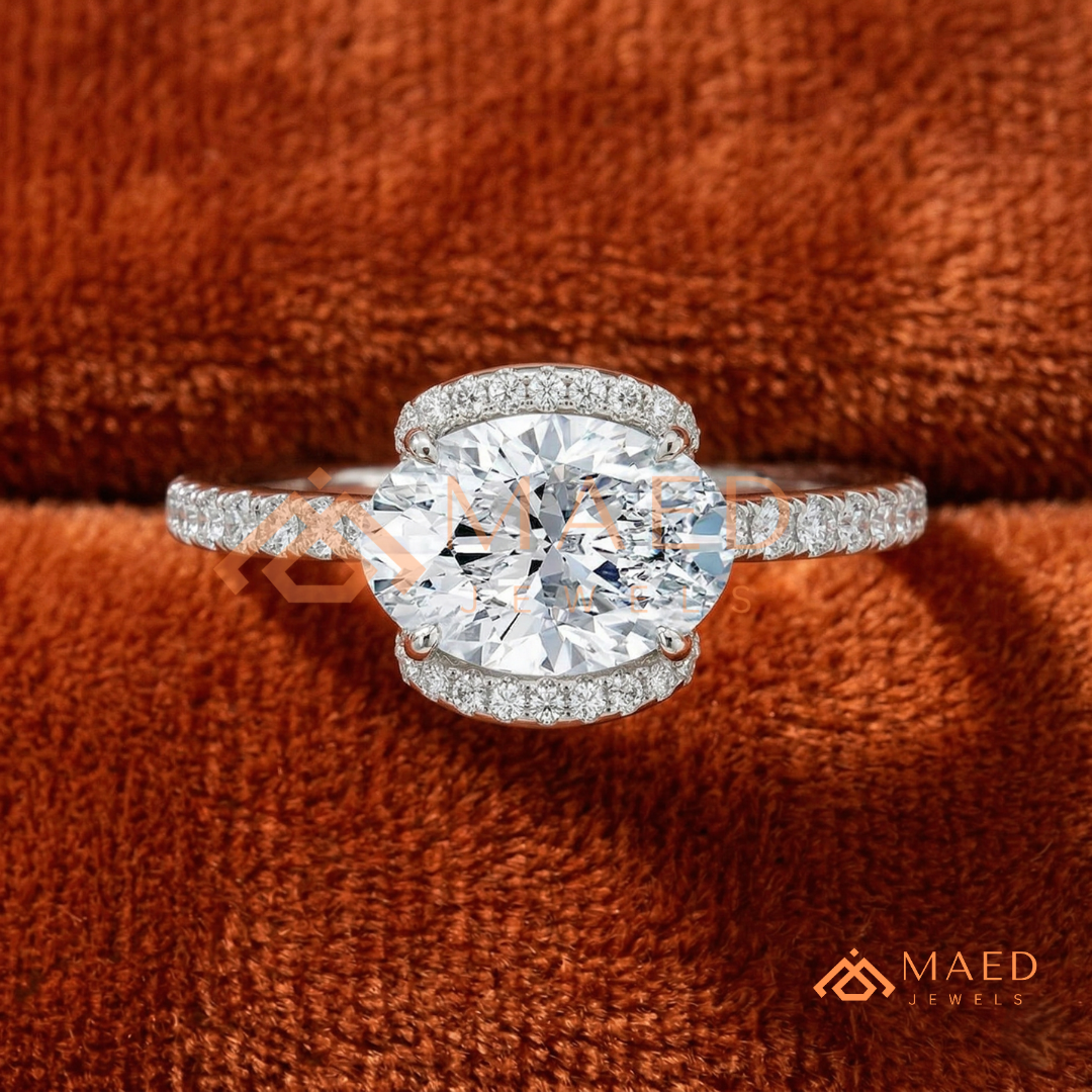 East-West Oval Cut Partial Halo Engagement Ring | 14k Gold, Rose Gold & Sterling Silver Shimmering Accented Band
