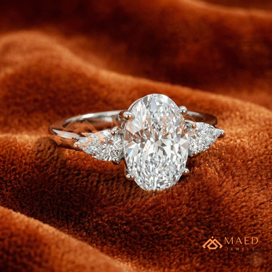 Oval Cut Engagement Ring with Pear Side Stones in Silver, 14K Gold, & 14K Rose Gold