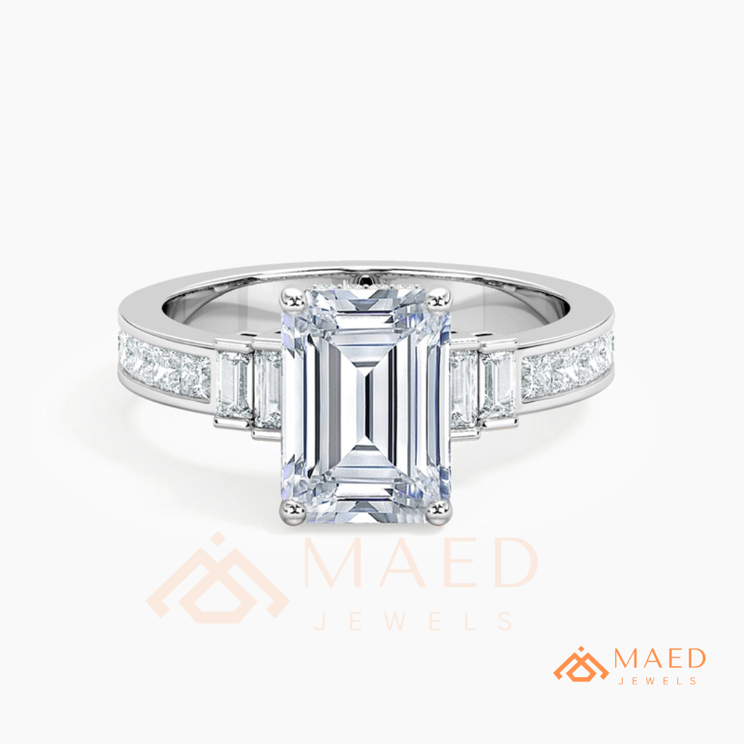 Emerald Cut Three-Stone Ring with Baguette and Channel Princess Band in Silver, 14K Gold, & 14K Rose Gold