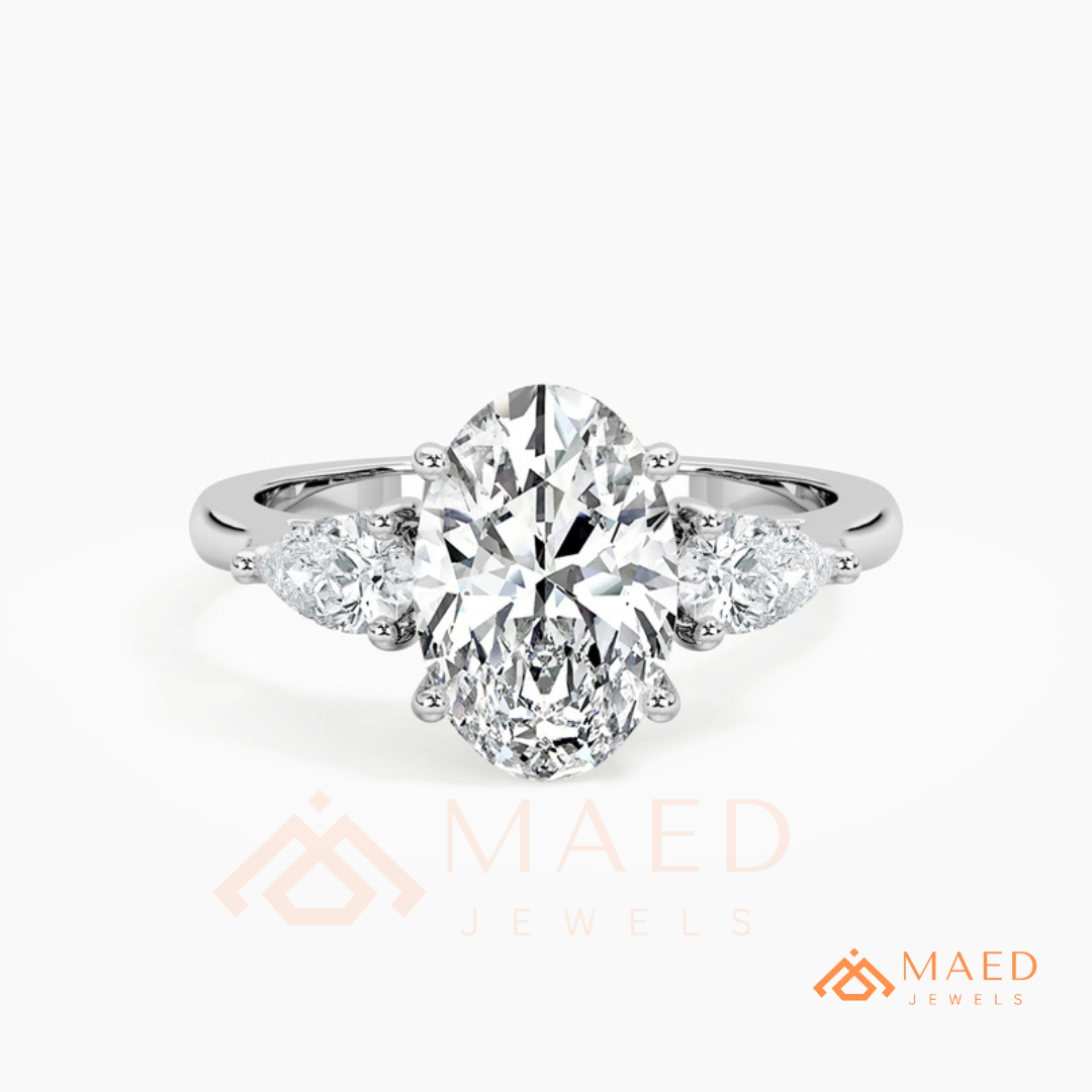 Oval Cut Engagement Ring with Pear Side Stones in Silver, 14K Gold, & 14K Rose Gold