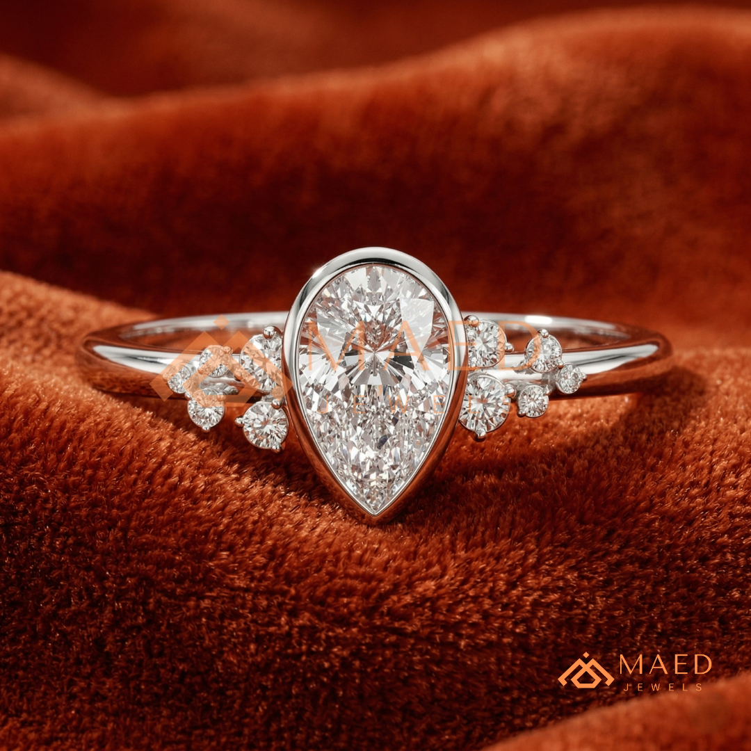 Pear Cut Bezel Set Engagement Ring with Cluster Accent Diamonds in 14K Gold, Rose Gold & Silver
