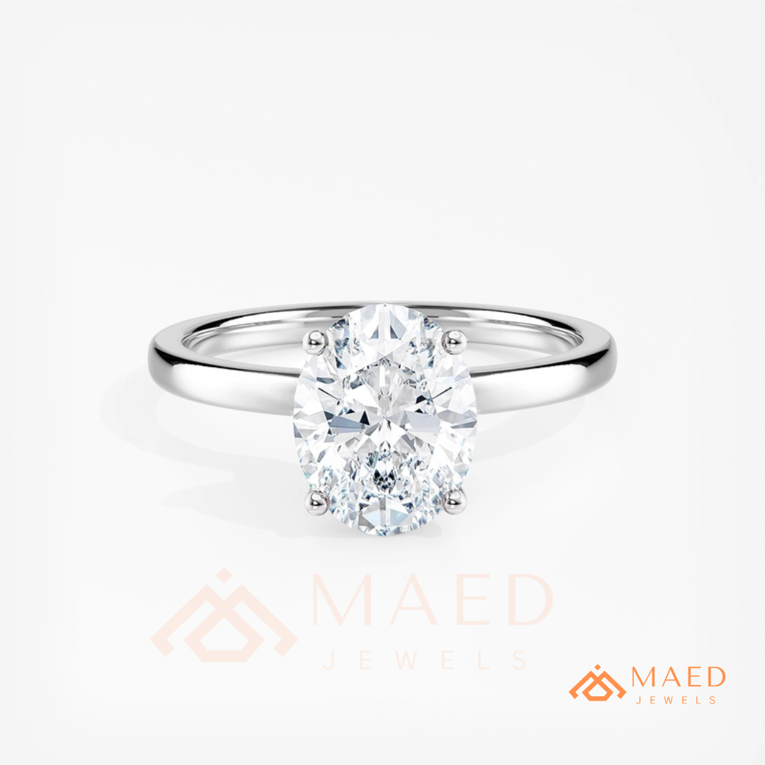 Classic Oval Cut Solitaire Engagement Ring in Silver, 14K Gold, & 14K Rose Gold