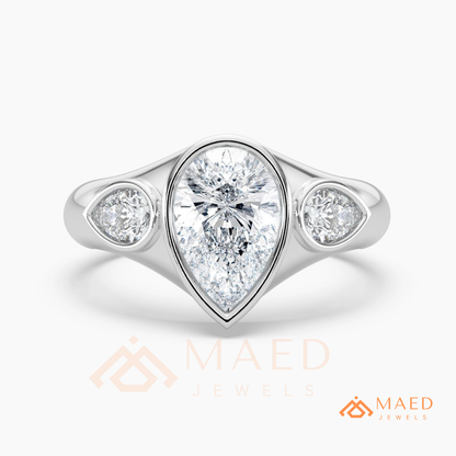 Modern Three-Stone Pear Shaped Bezel Engagement Ring in Silver, 14K Gold & Rose Gold