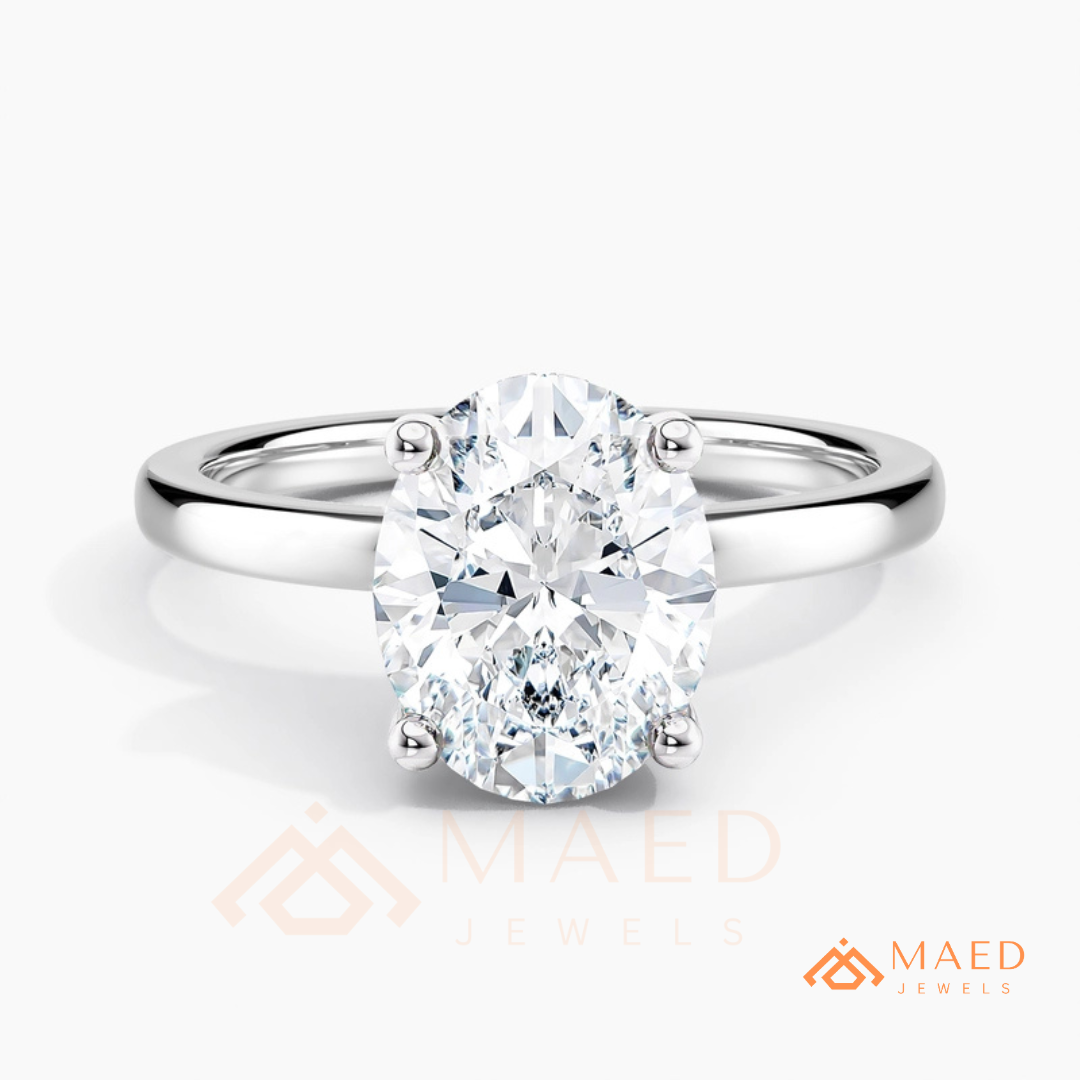 Classic Oval Cut Solitaire Engagement Ring in Silver, 14K Gold, & 14K Rose Gold