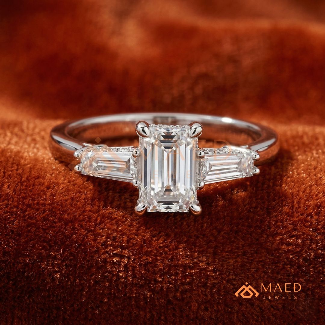 Emerald Cut Three-Stone Engagement Ring with Tapered Baguettes in Silver, 14K Gold, & 14K Rose Gold
