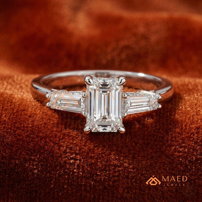 Emerald Cut Three-Stone Engagement Ring with Tapered Baguettes in Silver, 14K Gold, & 14K Rose Gold