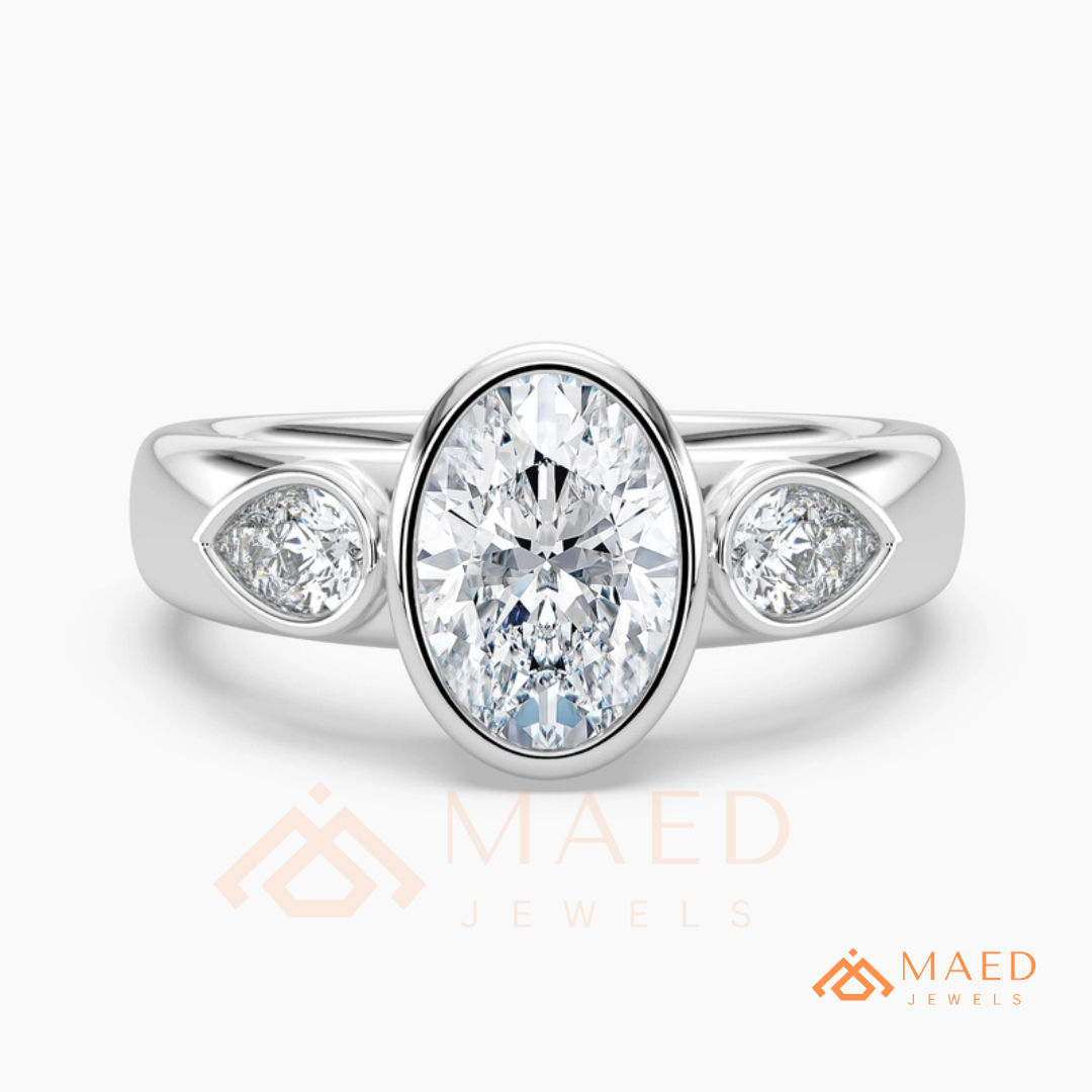 Bezel Set Oval Engagement Ring with Pear Side Stones in Silver, 14K Gold, & 14K Rose Gold