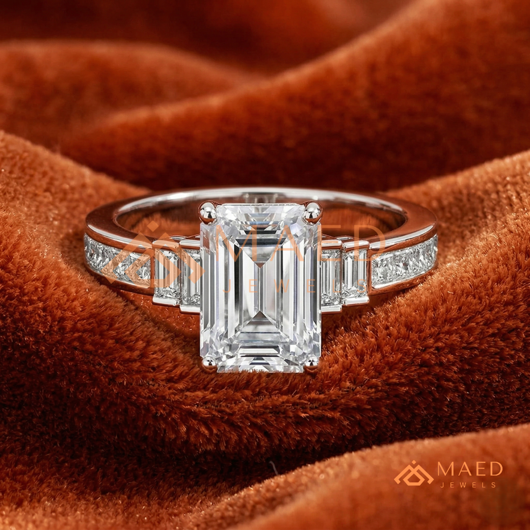 Emerald Cut Three-Stone Ring with Baguette and Channel Princess Band in Silver, 14K Gold, & 14K Rose Gold
