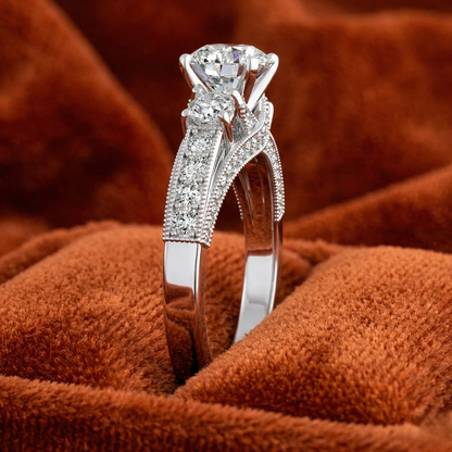 Round-Cut Three-Stone Engagement Ring with Milgrain Channel-Set Band