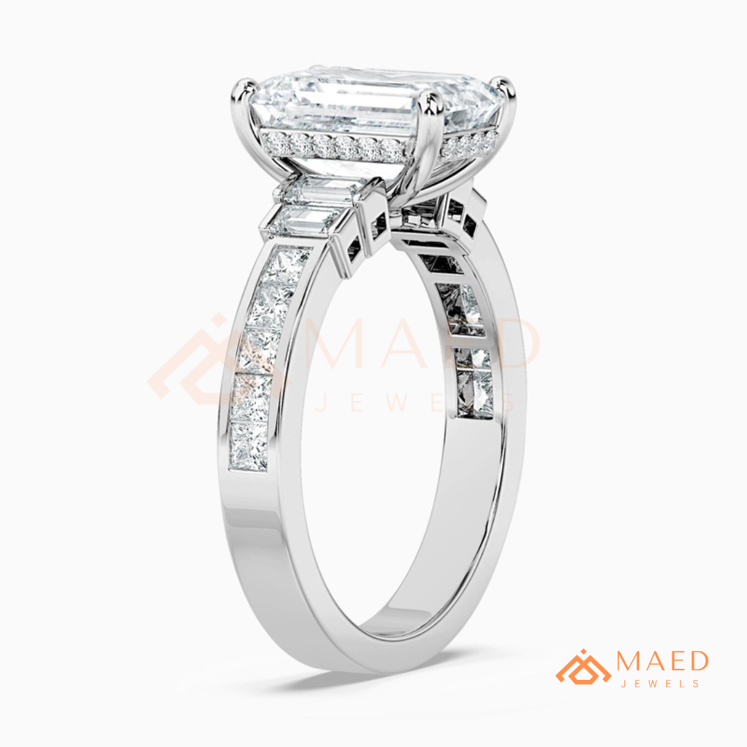 Emerald Cut Three-Stone Ring with Baguette and Channel Princess Band in Silver, 14K Gold, & 14K Rose Gold