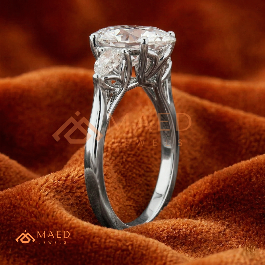Oval Cut Engagement Ring with Pear Side Stones in Silver, 14K Gold, & 14K Rose Gold