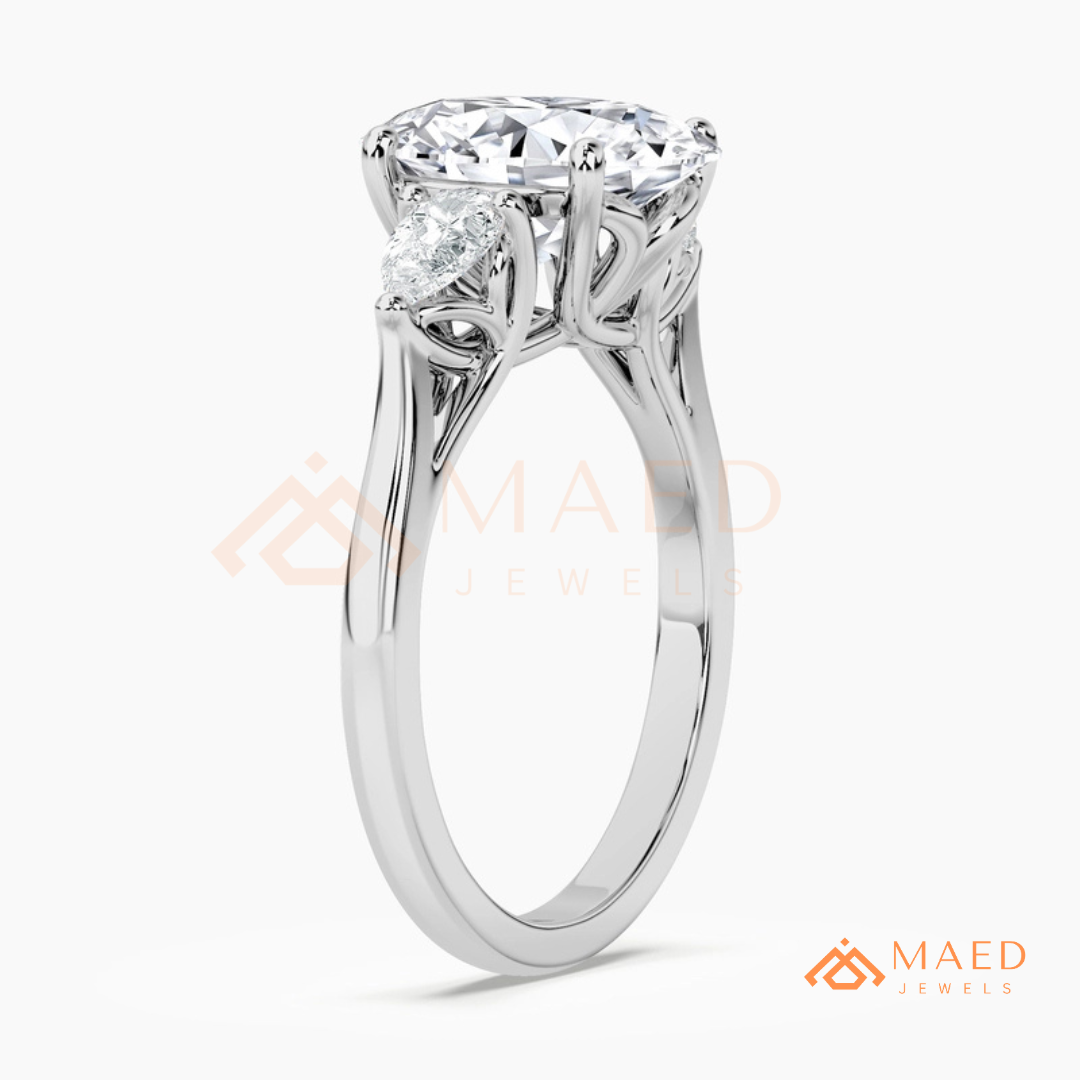 Oval Cut Engagement Ring with Pear Side Stones in Silver, 14K Gold, & 14K Rose Gold