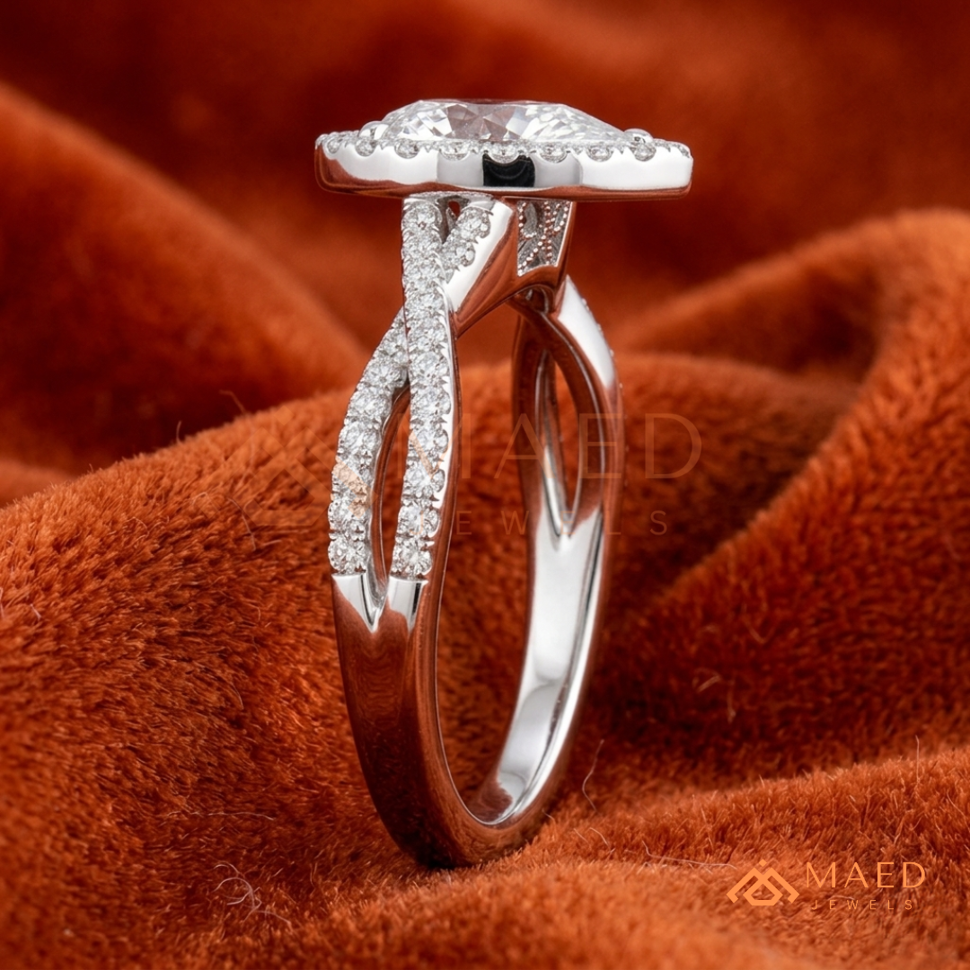 Pear-Cut Moissanite/Diamond Halo Engagement Ring with Twisted Pavé Band