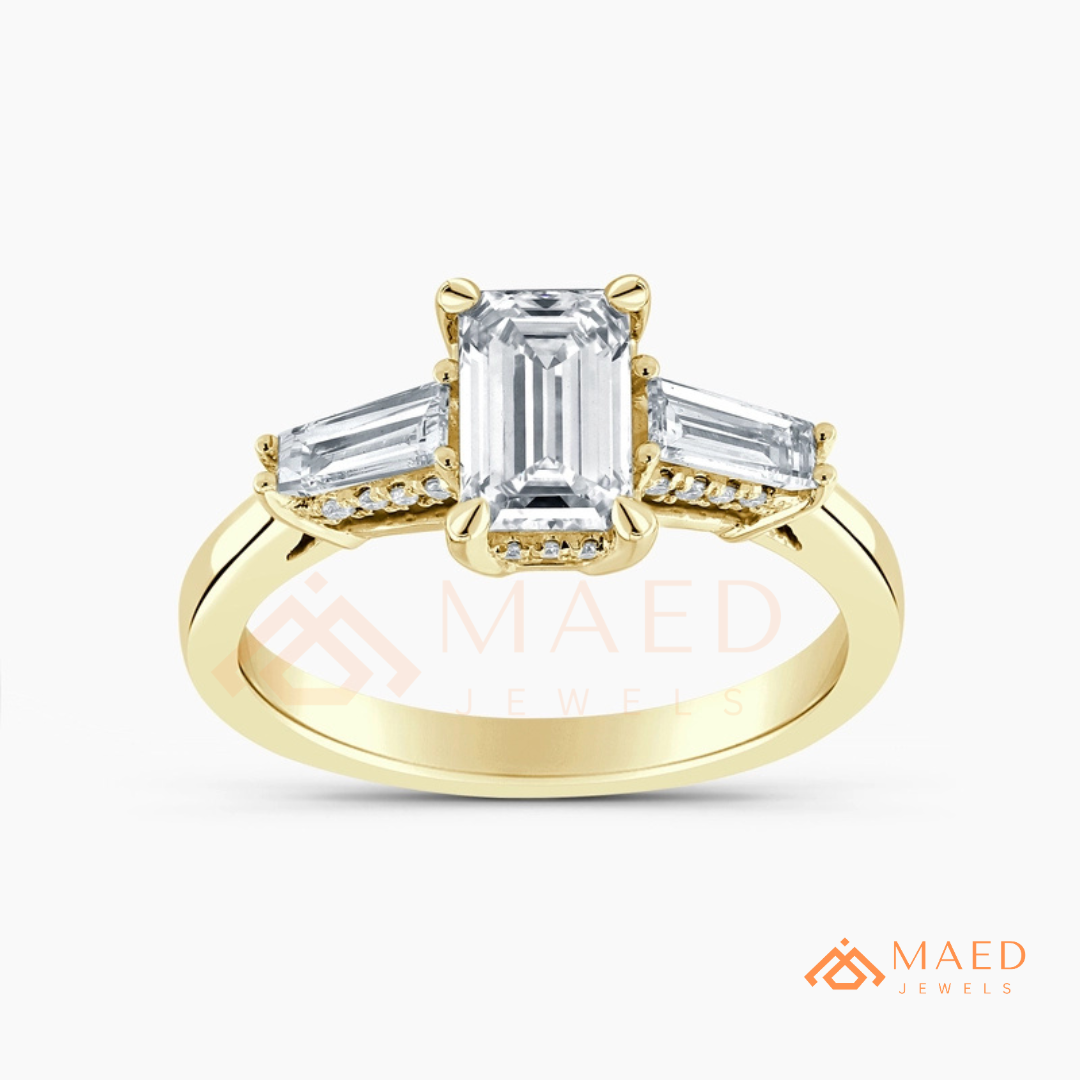 Emerald Cut Three-Stone Engagement Ring with Tapered Baguettes in Silver, 14K Gold, & 14K Rose Gold