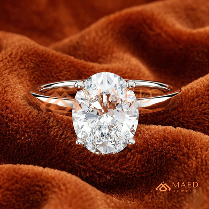 Classic Oval Cut Solitaire Engagement Ring in Silver, 14K Gold, & 14K Rose Gold