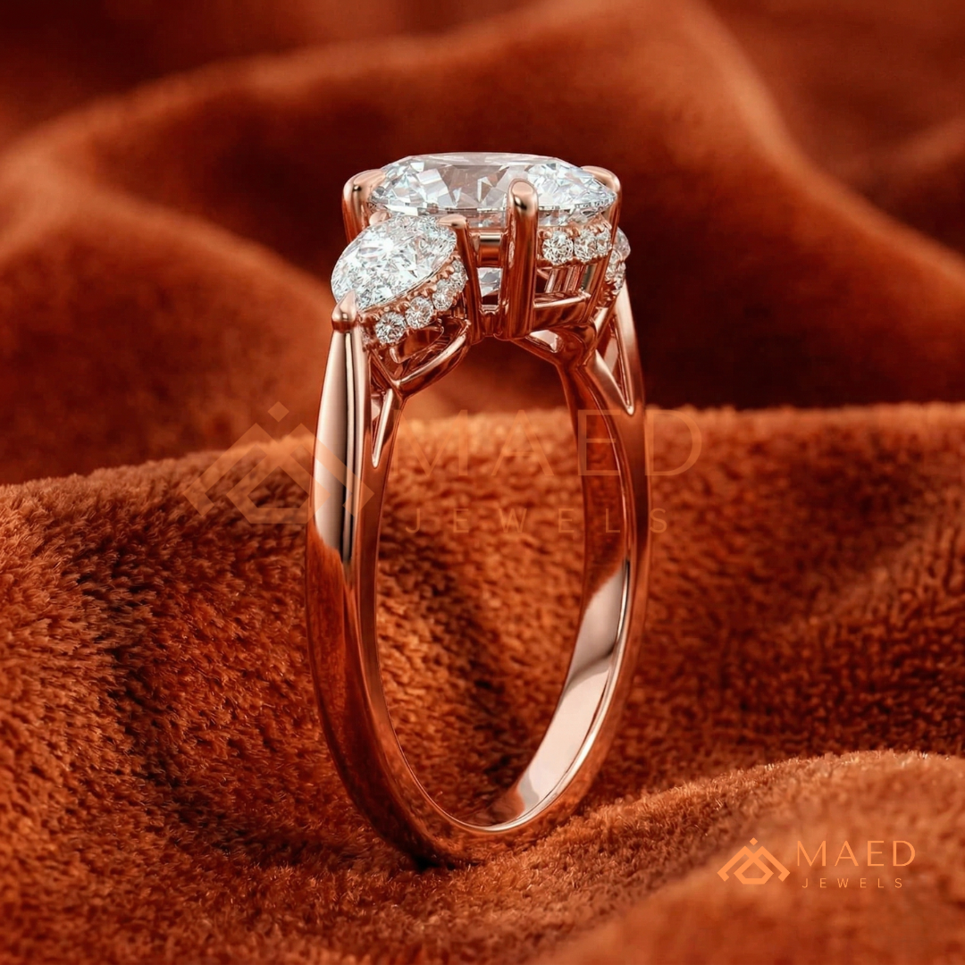 Classic Oval Cut Three-Stone Engagement Ring with Pear Side Stones in Silver, 14K Gold & Rose Gold