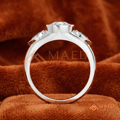 Modern Three-Stone Pear Shaped Bezel Engagement Ring in Silver, 14K Gold & Rose Gold