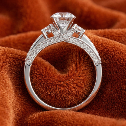 Round-Cut Three-Stone Engagement Ring with Milgrain Channel-Set Band