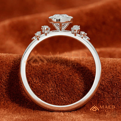 Pear Cut Bezel Set Engagement Ring with Cluster Accent Diamonds in 14K Gold, Rose Gold & Silver