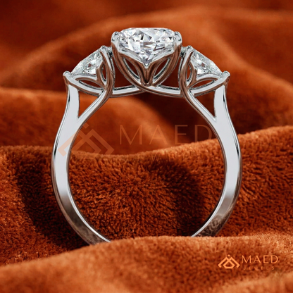 Oval Cut Engagement Ring with Pear Side Stones in Silver, 14K Gold, & 14K Rose Gold