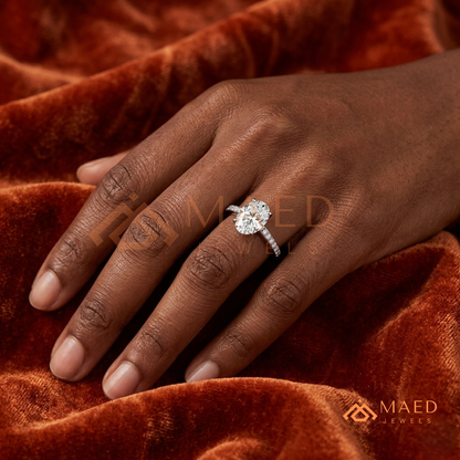 Elegant Oval-Cut Solitaire Engagement Ring with Pavé Band