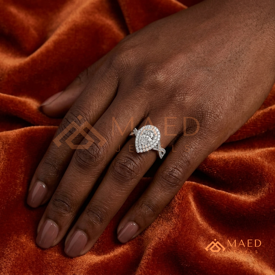 Double Halo Pear Cut Engagement Ring with Twisted Pave Band