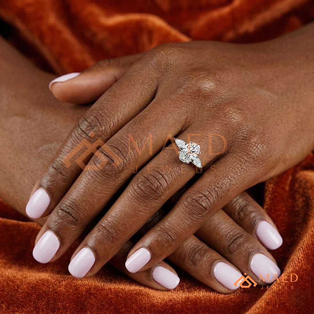 Oval Cut Engagement Ring with Pear Side Stones in Silver, 14K Gold, & 14K Rose Gold