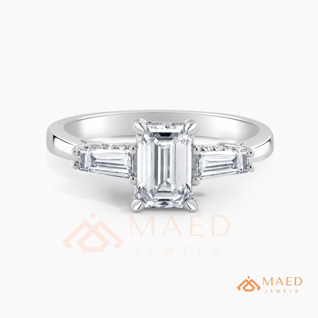 Emerald Cut Three-Stone Engagement Ring with Tapered Baguettes in Silver, 14K Gold, & 14K Rose Gold