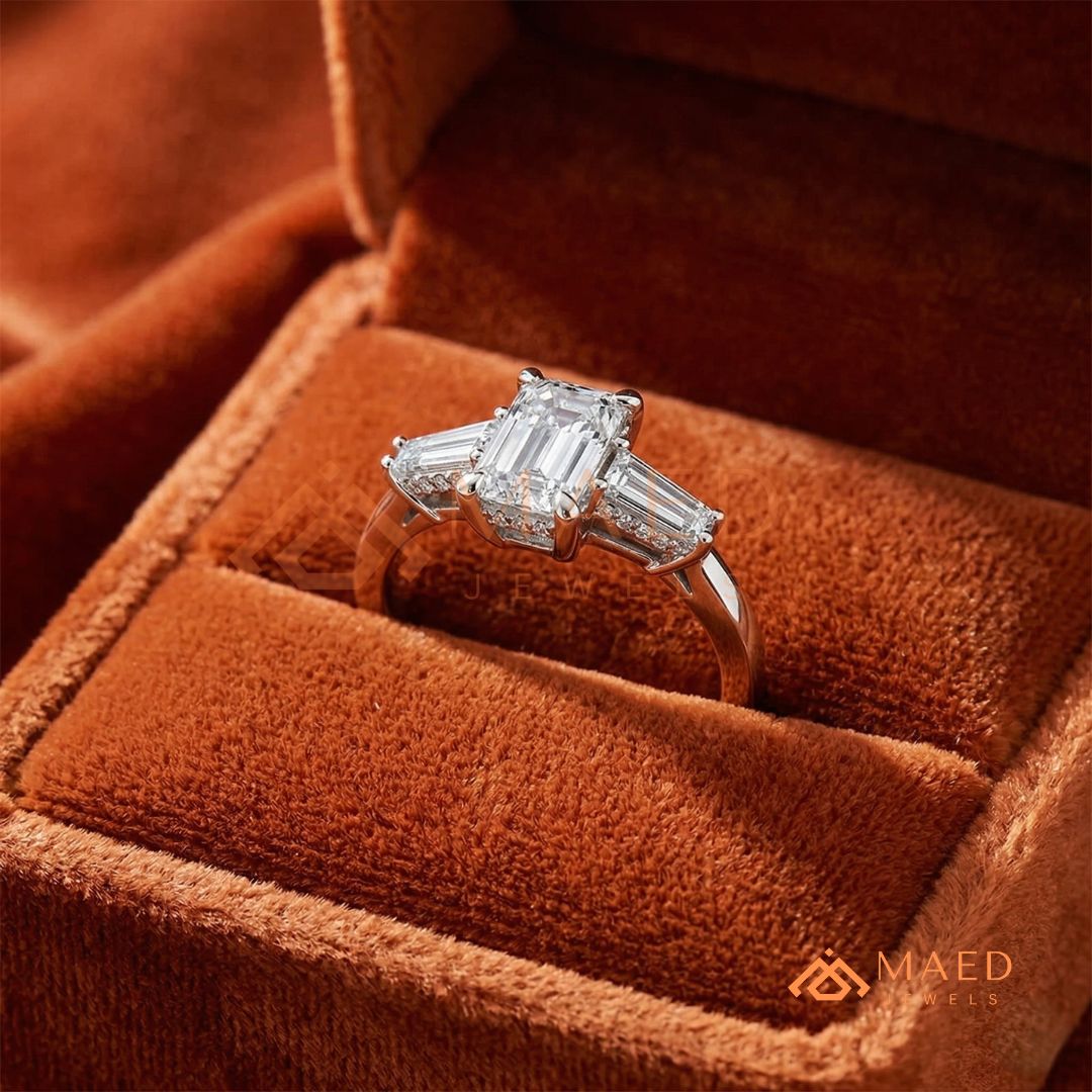 Emerald Cut Three-Stone Engagement Ring with Tapered Baguettes in Silver, 14K Gold, & 14K Rose Gold