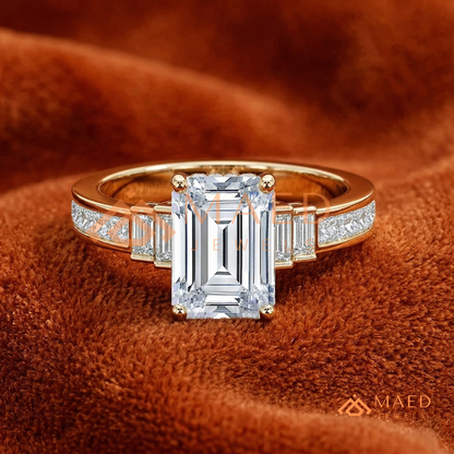 Emerald Cut Three-Stone Ring with Baguette and Channel Princess Band in Silver, 14K Gold, & 14K Rose Gold