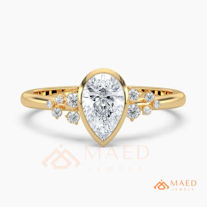 Pear Cut Bezel Set Engagement Ring with Cluster Accent Diamonds in 14K Gold, Rose Gold & Silver