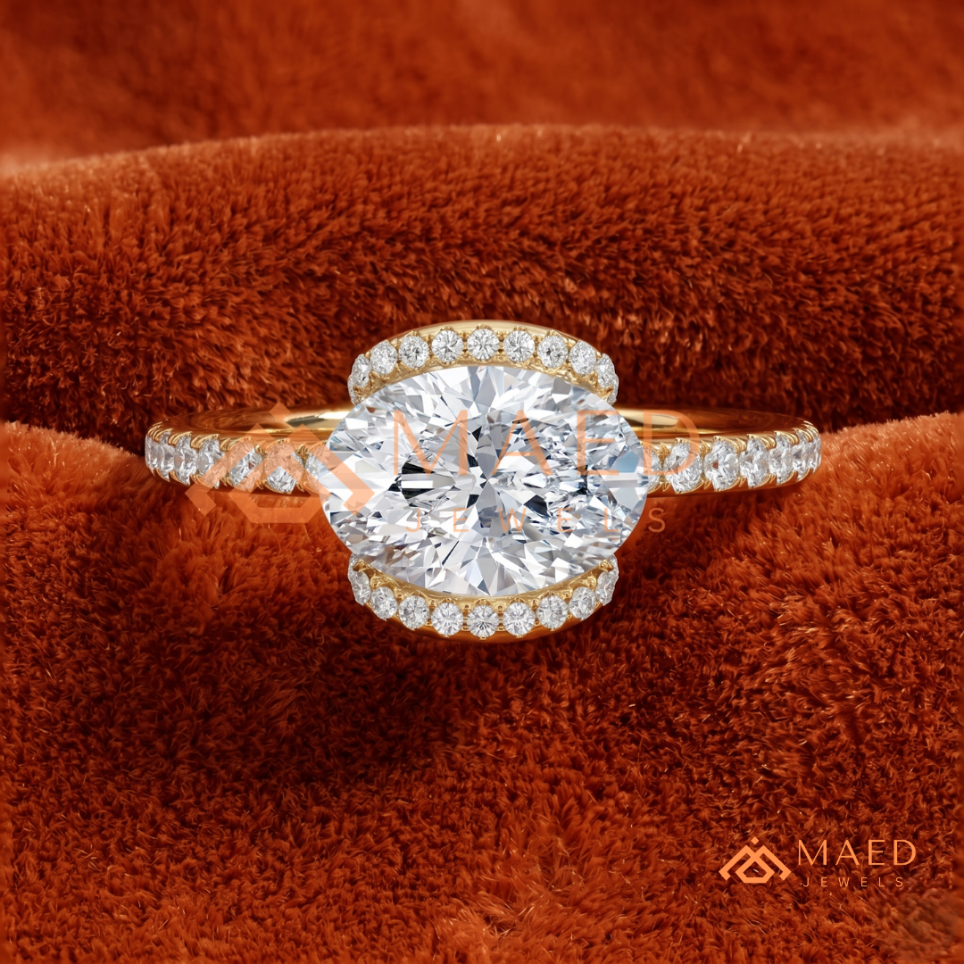 East-West Oval Cut Partial Halo Engagement Ring | 14k Gold, Rose Gold & Sterling Silver Shimmering Accented Band