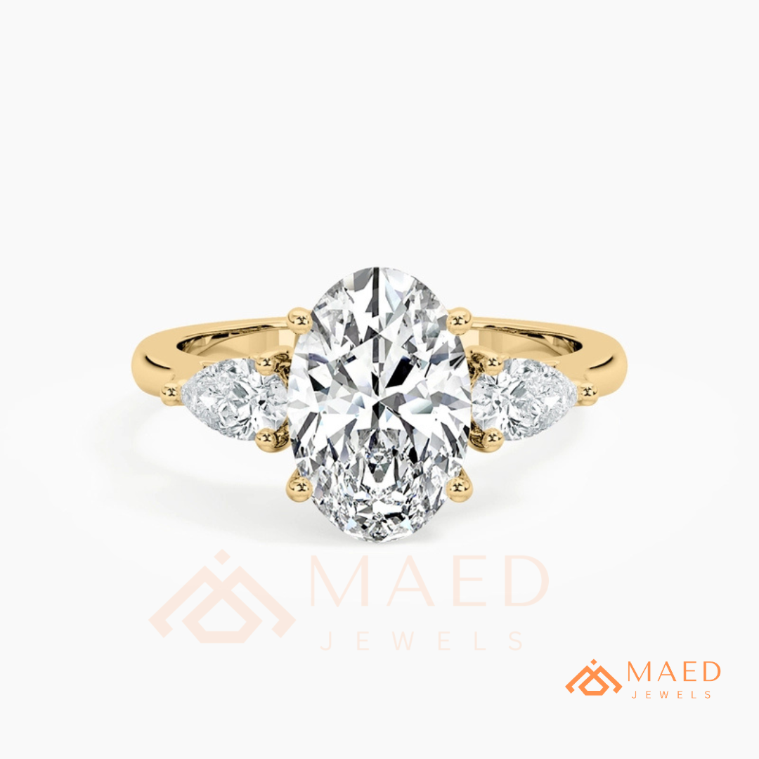 Oval Cut Engagement Ring with Pear Side Stones in Silver, 14K Gold, & 14K Rose Gold