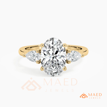 Oval Cut Engagement Ring with Pear Side Stones in Silver, 14K Gold, & 14K Rose Gold