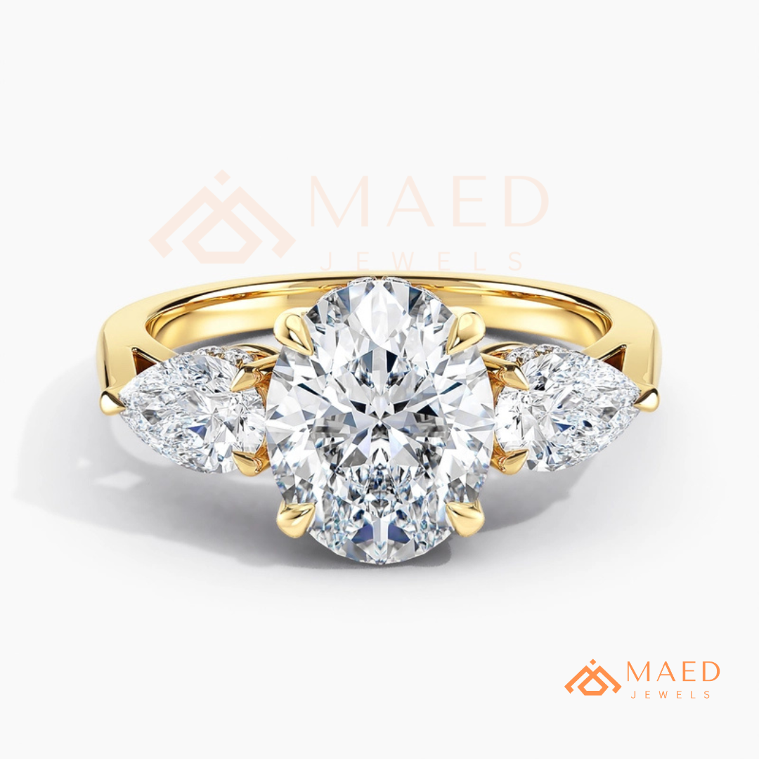 Classic Oval Cut Three-Stone Engagement Ring with Pear Side Stones in Silver, 14K Gold & Rose Gold