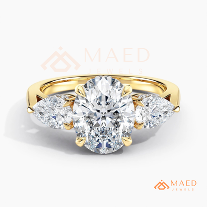 Classic Oval Cut Three-Stone Engagement Ring with Pear Side Stones in Silver, 14K Gold & Rose Gold