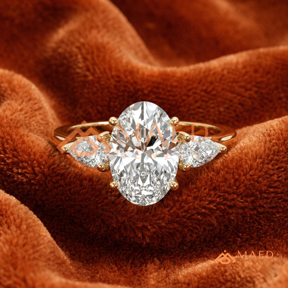 Oval Cut Engagement Ring with Pear Side Stones in Silver, 14K Gold, & 14K Rose Gold