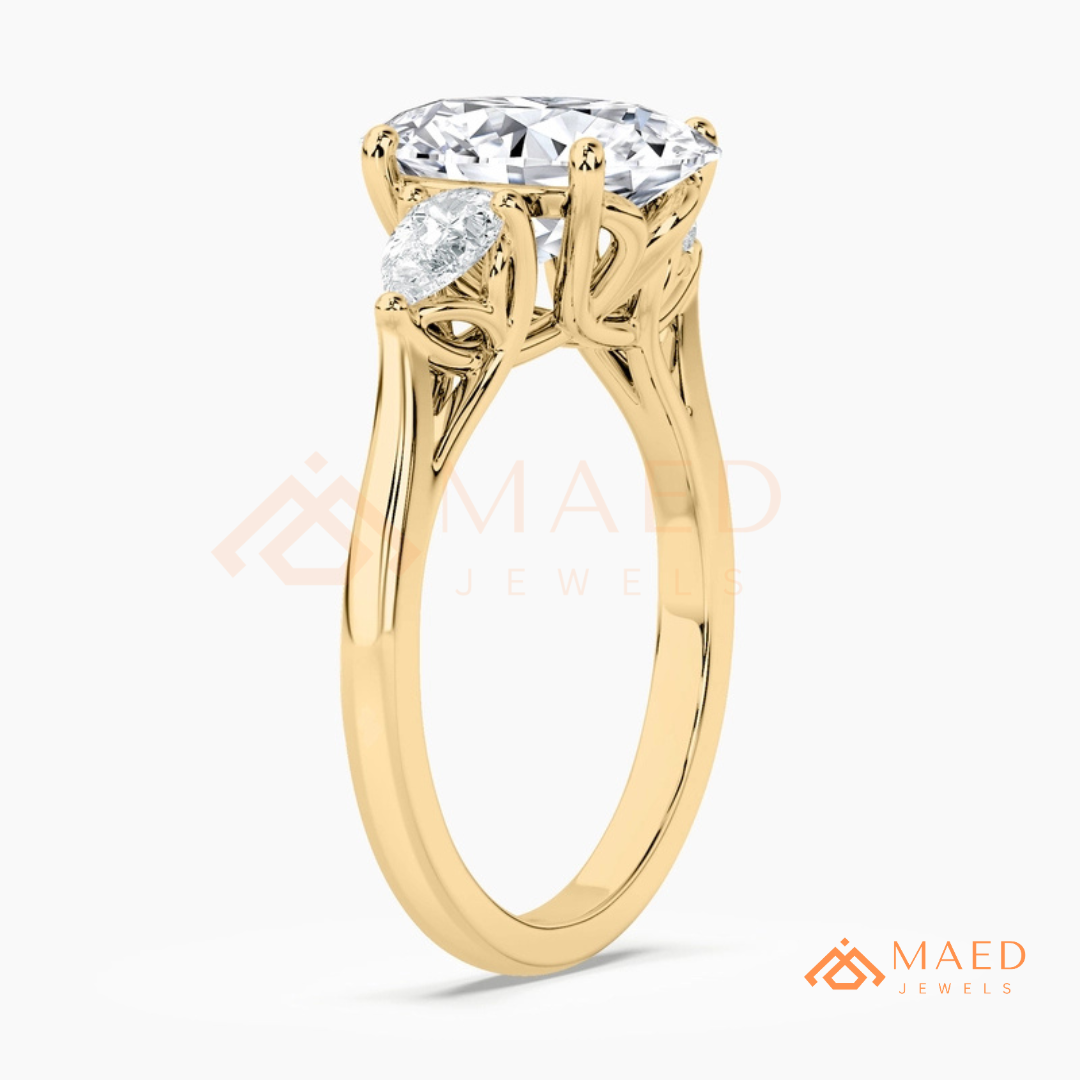 Oval Cut Engagement Ring with Pear Side Stones in Silver, 14K Gold, & 14K Rose Gold