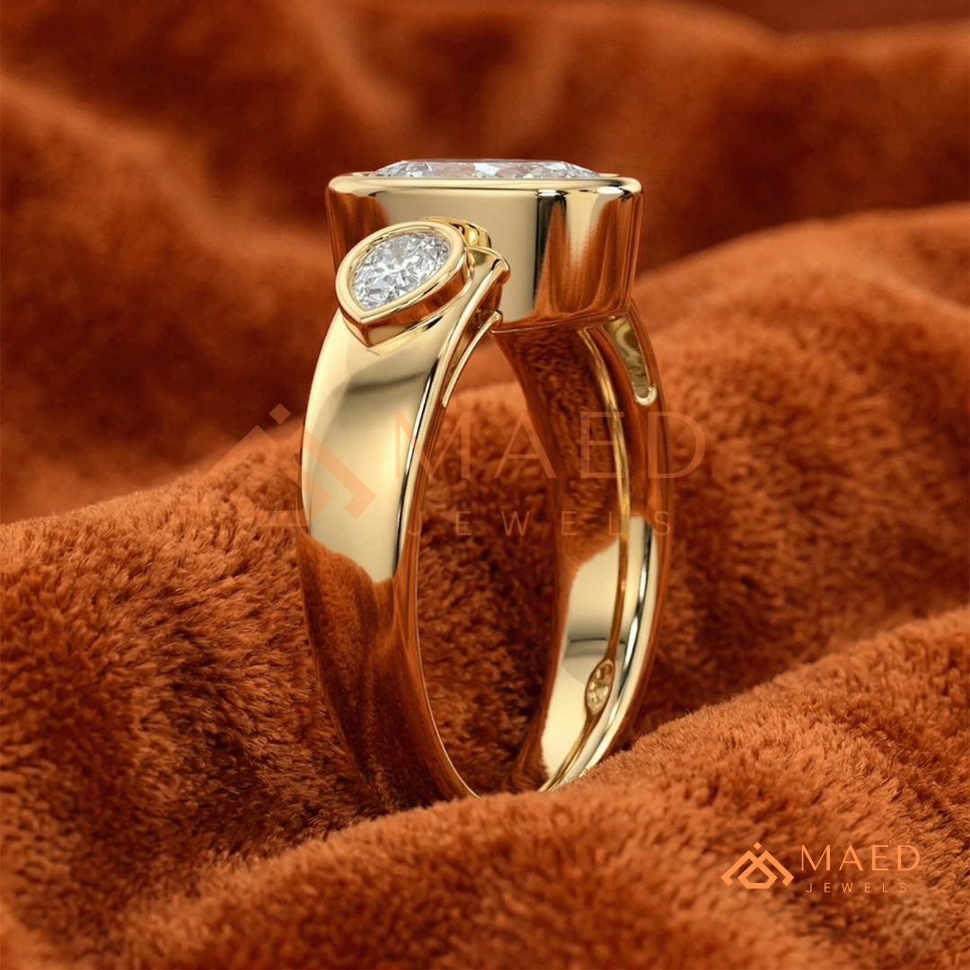 Bezel Set Oval Engagement Ring with Pear Side Stones in Silver, 14K Gold, & 14K Rose Gold