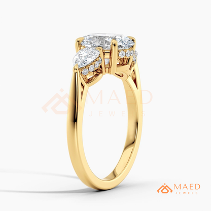 Classic Oval Cut Three-Stone Engagement Ring with Pear Side Stones in Silver, 14K Gold & Rose Gold